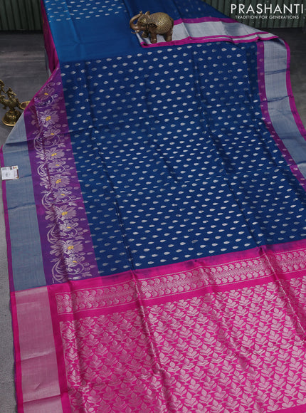 Pure uppada silk saree peacock blue and pink with allover silver zari woven thilak buttas and long floral design zari woven border