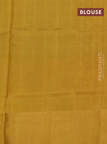 Pure uppada silk saree dark green and yellow with allover zari woven thilak buttas and long floral design zari woven border