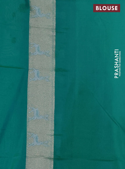 Banarasi semi katan silk saree teal green with allover silver & gold zari weaves and deer design zari woven border