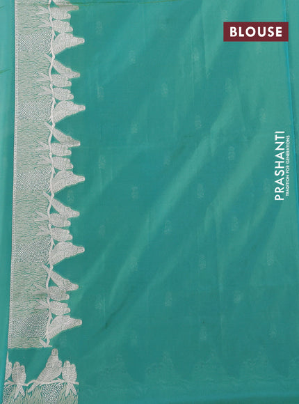 Banarasi semi katan silk saree dual shade of teal bluish green with allover zari woven buttas and parrot design zari woven border