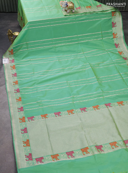 Banarasi semi katan silk saree teal green shade with allover zari weaves and rich zari woven border