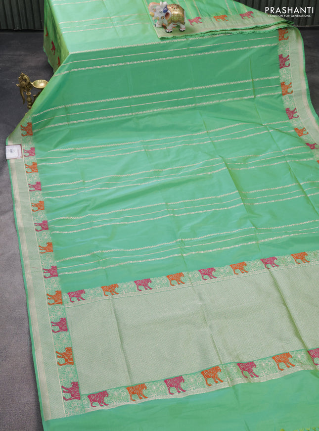 Banarasi semi katan silk saree teal green shade with allover zari weaves and rich zari woven border