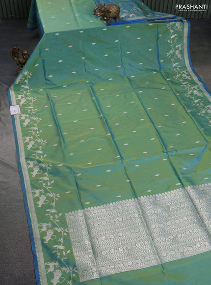 Banarasi semi katan silk saree dual shade of teal bluish green with allover zari woven buttas and rich zari woven border