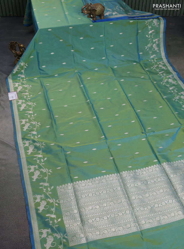 Banarasi semi katan silk saree dual shade of teal bluish green with allover zari woven buttas and rich zari woven border
