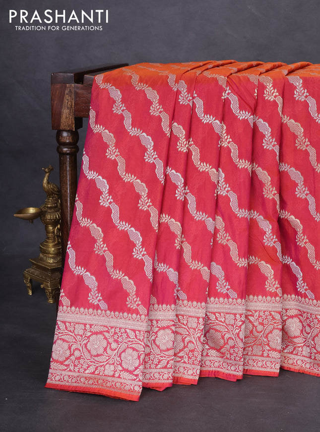 Banarasi semi katan silk saree dual shade of magenta pinkish orange with allover silver & gold zari weaves and floral zari woven border