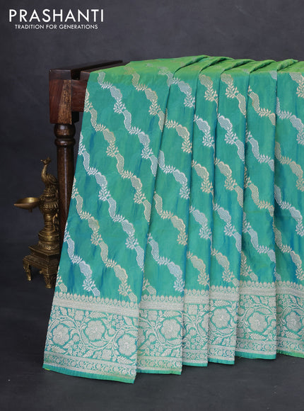 Banarasi semi katan silk saree teal green with allover silver & gold zari weaves and floral zari woven border