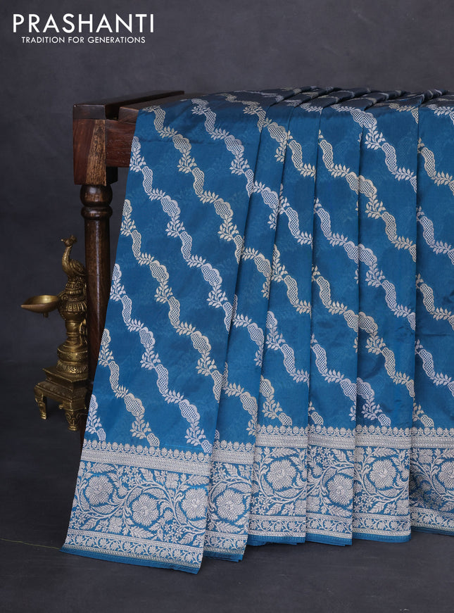 Banarasi semi katan silk saree peacock blue with allover silver & gold zari weaves and floral zari woven border
