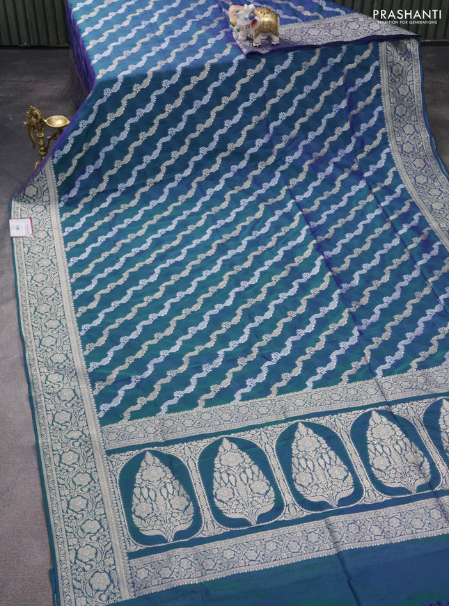 Banarasi semi katan silk saree dual shade of bluish green with allover silver & gold zari weaves and floral zari woven border
