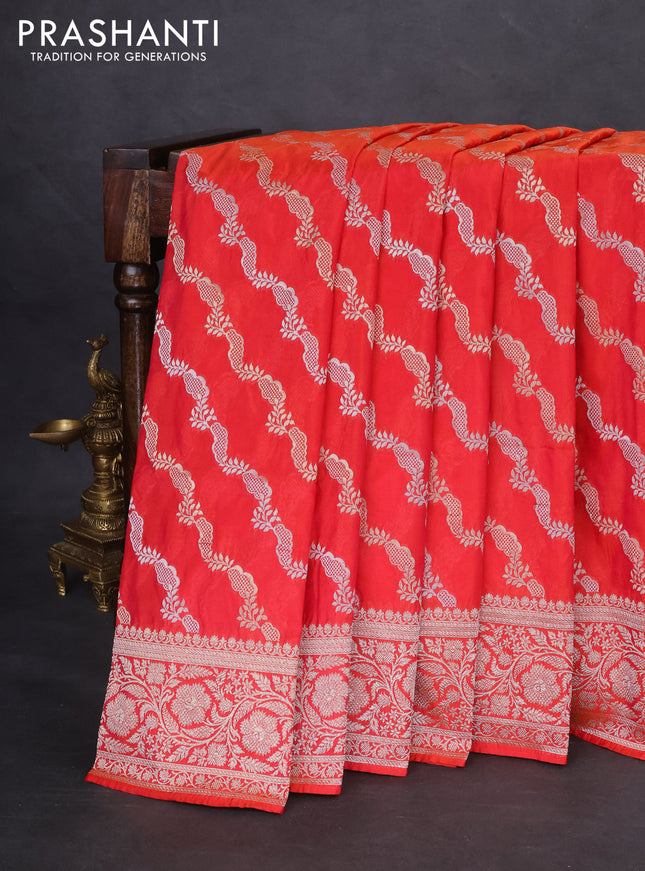 Banarasi semi katan silk saree dual shade of pinkish orange with allover silver & gold zari weaves and floral zari woven border