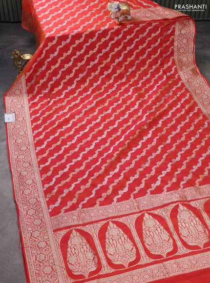 Banarasi semi katan silk saree dual shade of pinkish orange with allover silver & gold zari weaves and floral zari woven border