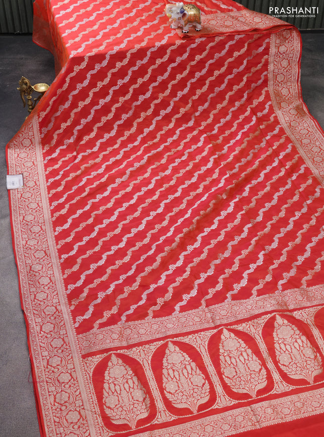Banarasi semi katan silk saree dual shade of pinkish orange with allover silver & gold zari weaves and floral zari woven border