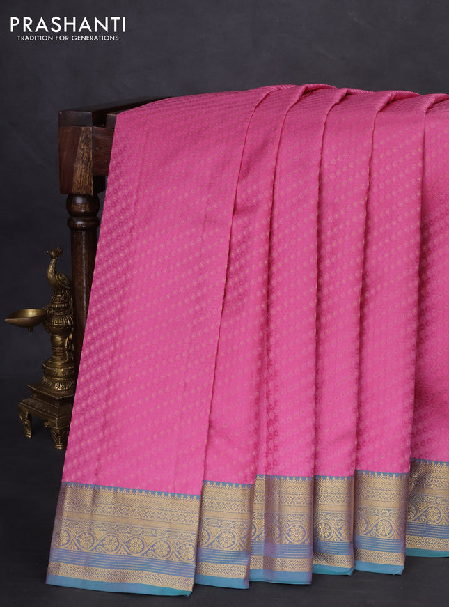 Pure kanchipuram silk saree pink and dual shade of teal blue with allover self emboss & zari buttas and rich zari woven border