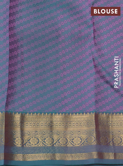 Pure kanchipuram silk saree pink and dual shade of teal blue with allover self emboss & zari buttas and rich zari woven border