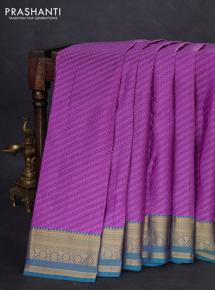 Pure kanchipuram silk saree lavender and dual shade of teal green with allover self emboss & zari buttas and rich zari woven border