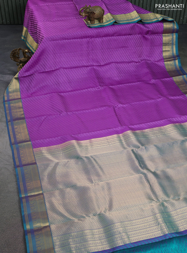 Pure kanchipuram silk saree lavender and dual shade of teal green with allover self emboss & zari buttas and rich zari woven border