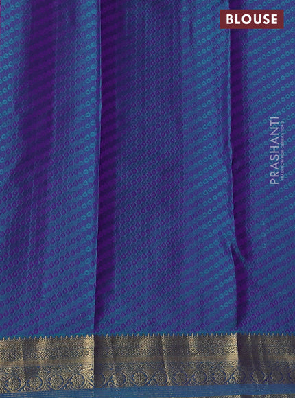 Pure kanchipuram silk saree lavender and dual shade of teal green with allover self emboss & zari buttas and rich zari woven border