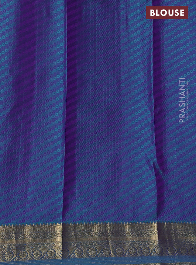 Pure kanchipuram silk saree lavender and dual shade of teal green with allover self emboss & zari buttas and rich zari woven border