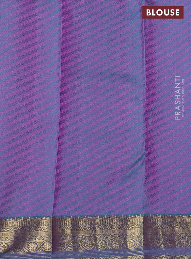 Pure kanchipuram silk saree lavender shade and dual shade of teal blue with allover self emboss & zari buttas and rich zari woven border