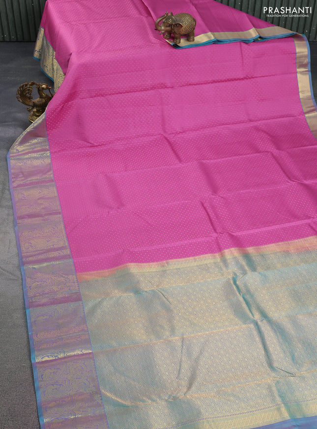Pure kanchipuram silk saree pink and dual shade of teal blue with allover self emboss & zari buttas and paisley zari woven border
