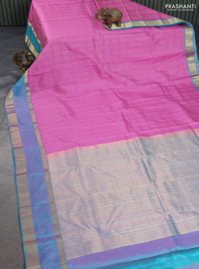 Pure kanchipuram silk saree pink and dual shade of teal blue with allover zari checked pattern and rettapet zari woven border
