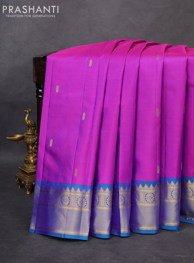 Pure kanchipuram silk saree purple and dual shade of bluish green with zari woven buttas and zari woven border