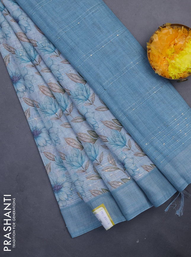 Linen cotton saree pastel blue with floral prints & sequin work and silver zari woven border