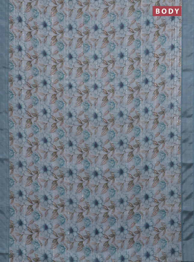 Linen cotton saree pastel blue with floral prints & sequin work and silver zari woven border