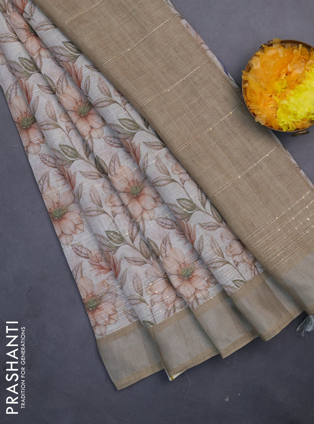 Linen cotton saree cream and beige with floral prints & sequin work and silver zari woven border