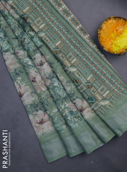 Linen cotton saree sap green with floral prints & sequin work and silver zari woven border