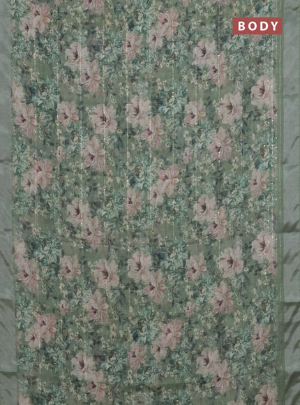 Linen cotton saree sap green with floral prints & sequin work and silver zari woven border