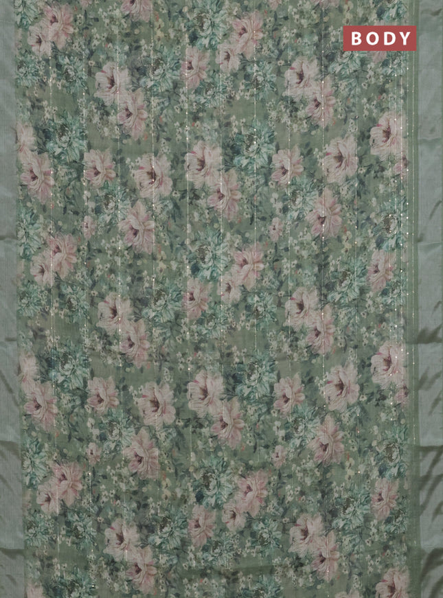 Linen cotton saree sap green with floral prints & sequin work and silver zari woven border