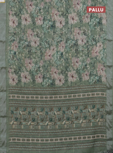 Linen cotton saree sap green with floral prints & sequin work and silver zari woven border