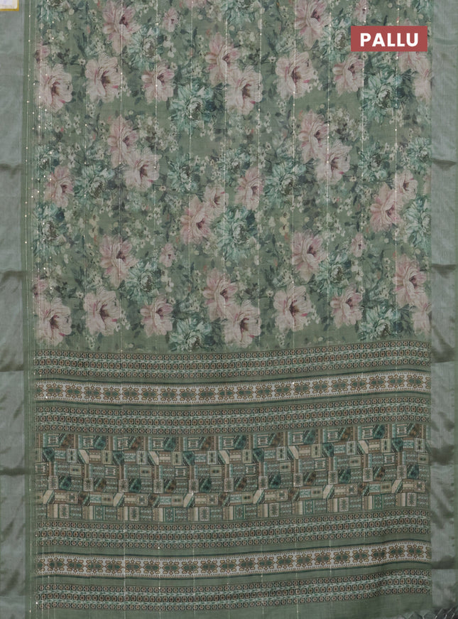Linen cotton saree sap green with floral prints & sequin work and silver zari woven border