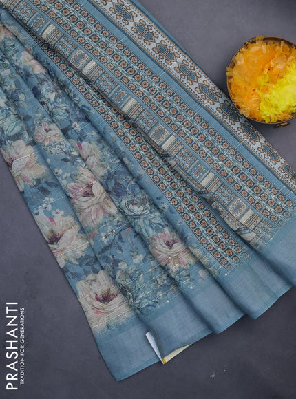 Linen cotton saree pastel blue with floral prints & sequin work and silver zari woven border
