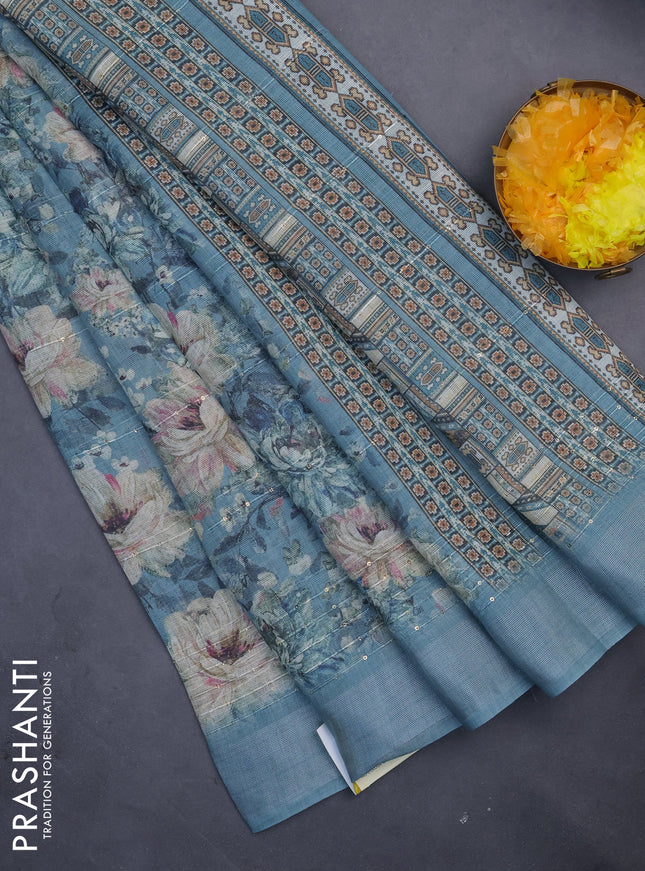 Linen cotton saree pastel blue with floral prints & sequin work and silver zari woven border