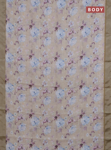 Linen cotton saree sandal and mustard shade with floral prints & sequin work and silver zari woven border