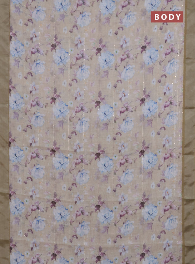 Linen cotton saree sandal and mustard shade with floral prints & sequin work and silver zari woven border