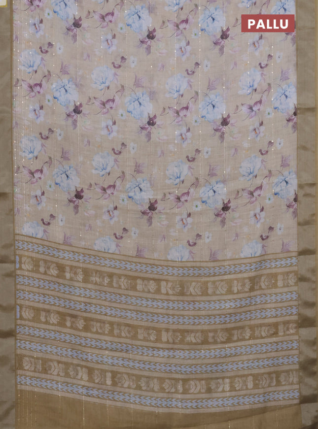 Linen cotton saree sandal and mustard shade with floral prints & sequin work and silver zari woven border