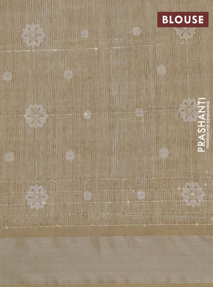 Linen cotton saree sandal and mustard shade with floral prints & sequin work and silver zari woven border