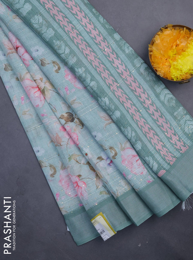 Linen cotton saree pastel green with floral prints & sequin work and silver zari woven border