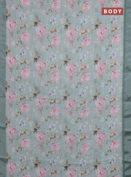Linen cotton saree pastel green with floral prints & sequin work and silver zari woven border