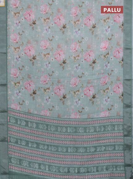 Linen cotton saree pastel green with floral prints & sequin work and silver zari woven border