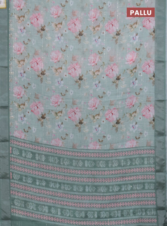 Linen cotton saree pastel green with floral prints & sequin work and silver zari woven border