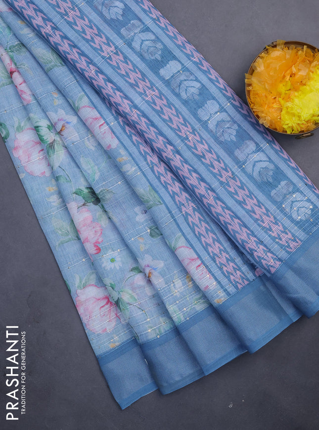 Linen cotton saree pastel blue with floral prints & sequin work and silver zari woven border