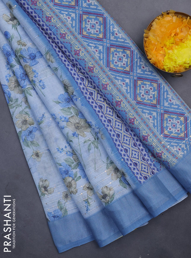 Linen cotton saree pastel blue with floral prints & sequin work and silver zari woven border
