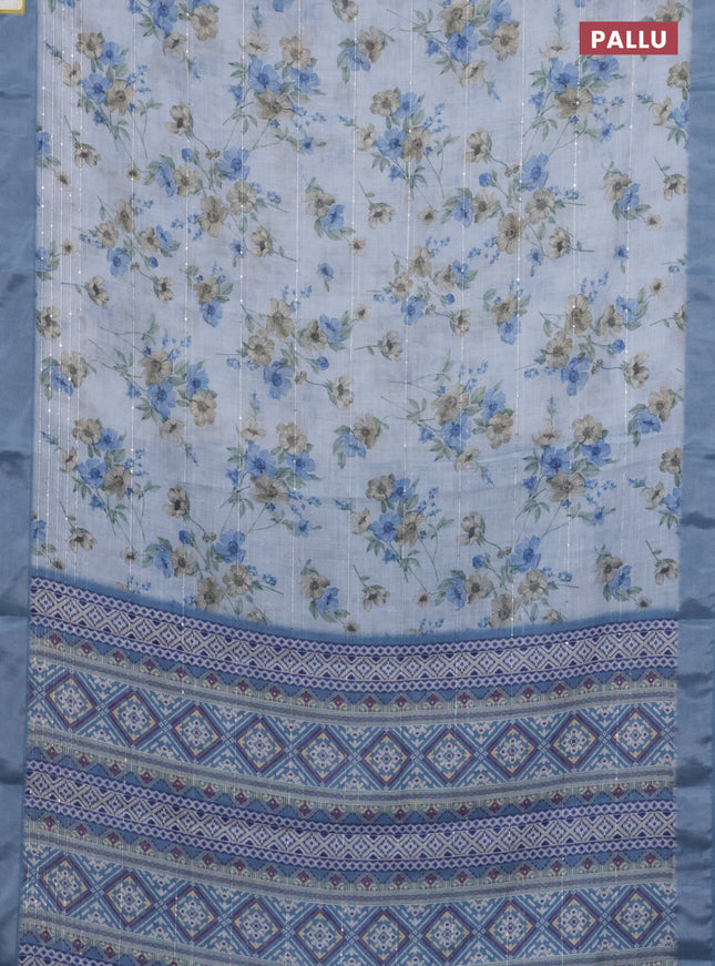 Linen cotton saree pastel blue with floral prints & sequin work and silver zari woven border