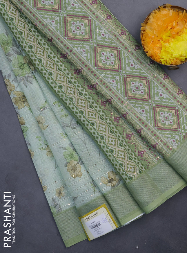Linen cotton saree pastel green with floral prints & sequin work and silver zari woven border