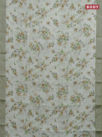 Linen cotton saree pastel green with floral prints & sequin work and silver zari woven border