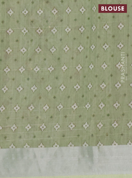Linen cotton saree pastel green with floral prints & sequin work and silver zari woven border