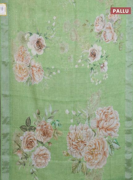 Linen cotton saree light green with floral prints & sequin work and silver zari woven border